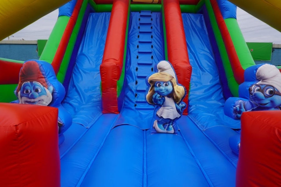 Vente château gonflable toboggan Schtroumpfs