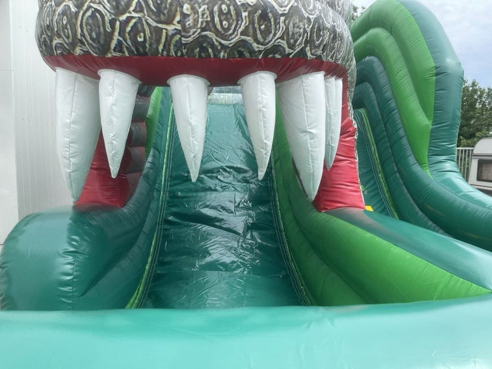 Vente château gonflable toboggan Dinosaure